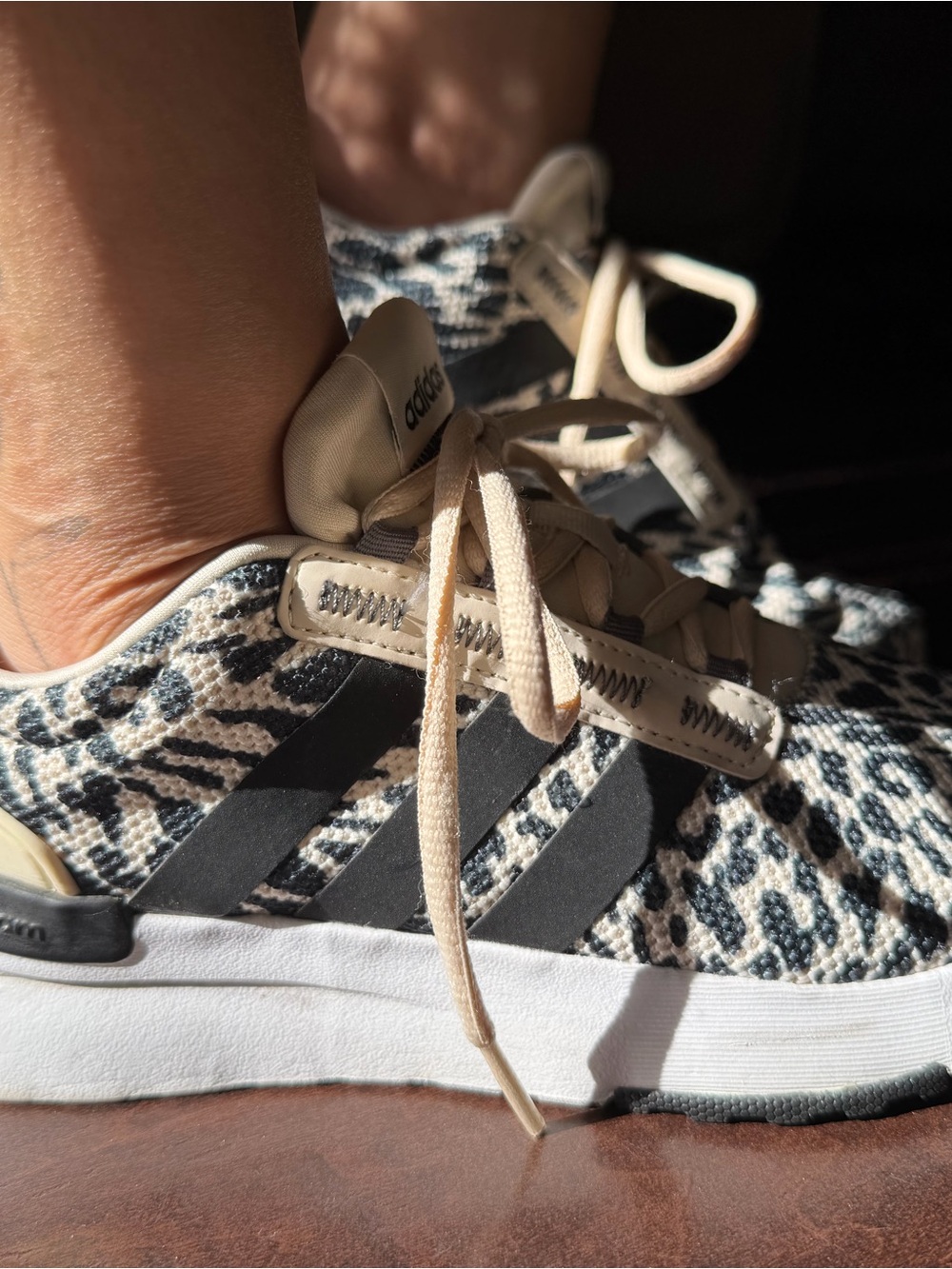 adidas big kids Leopard-Print Knit Sneakers in Cream and Black